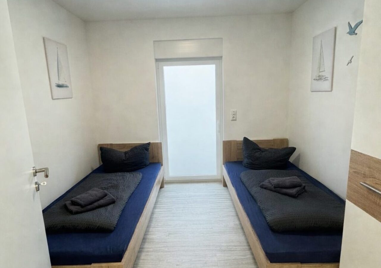 Kapitänsdeck, Schlafzimmer mit getrennten Betten, 4 Personen Wohnung, Malchow